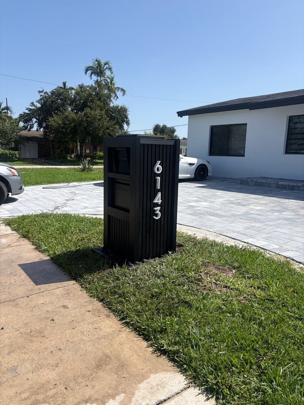Close view of a powder-coated aluminum mailbox finish holding up against coastal salt air