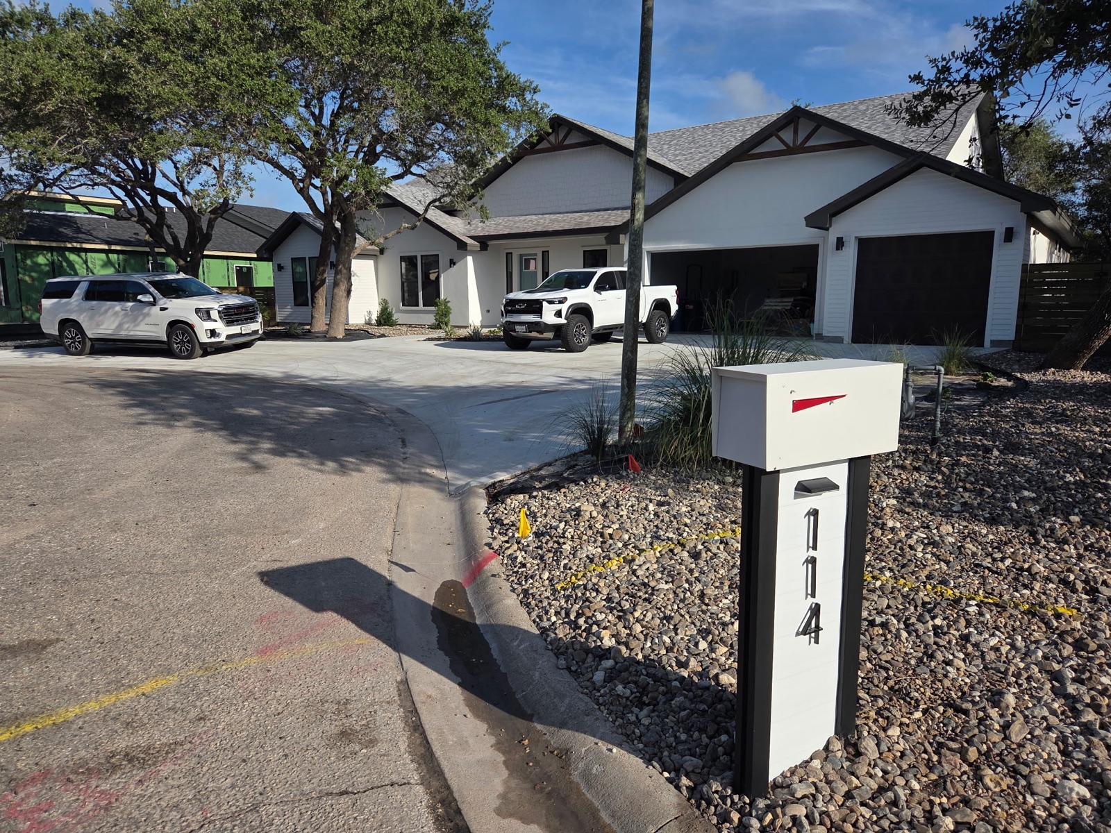 A custom mailbox in an approved community color with matching post and address numbers