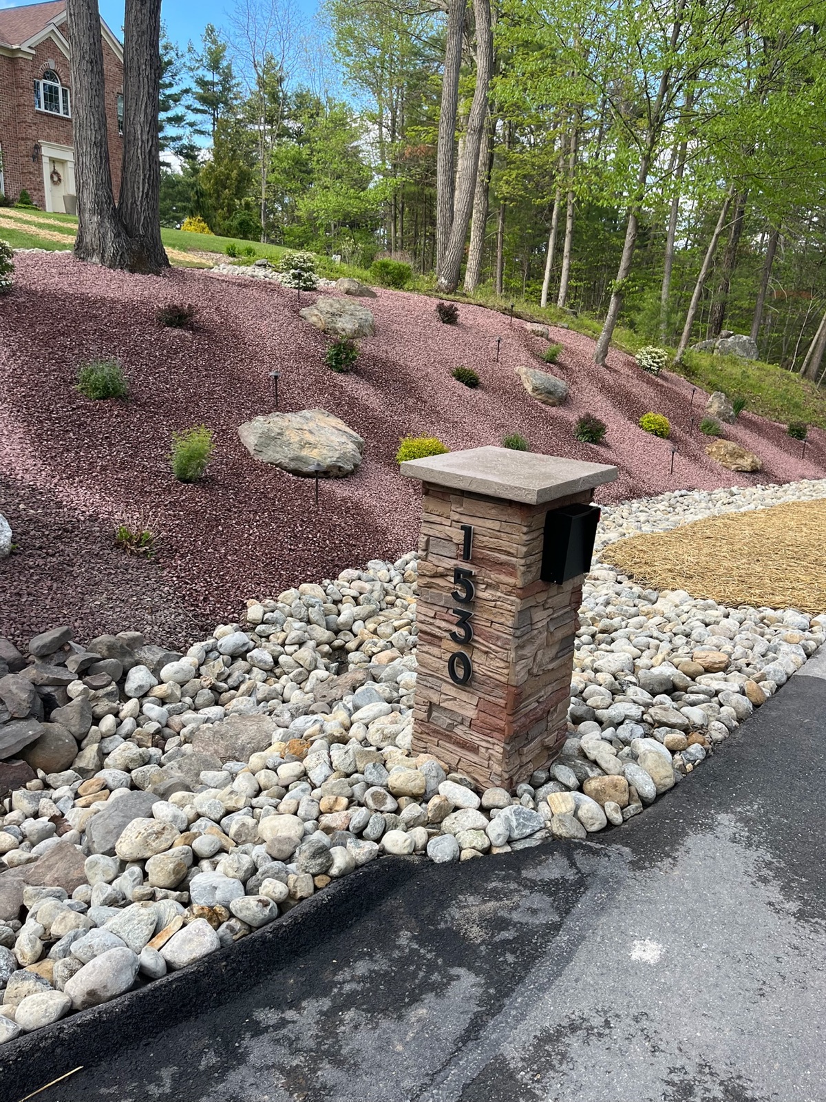 A custom mailbox and post at the curb of a Central Florida residential community
