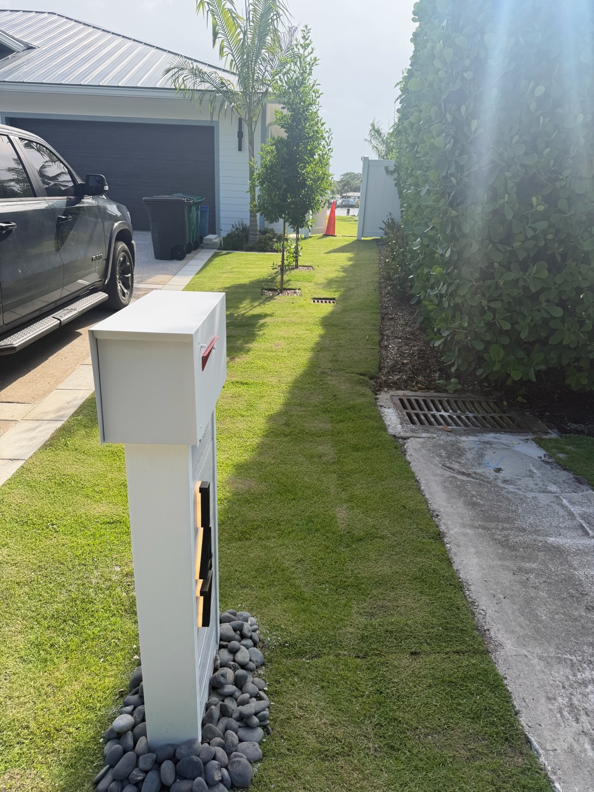 Matching custom mailboxes along a residential street in an HOA community