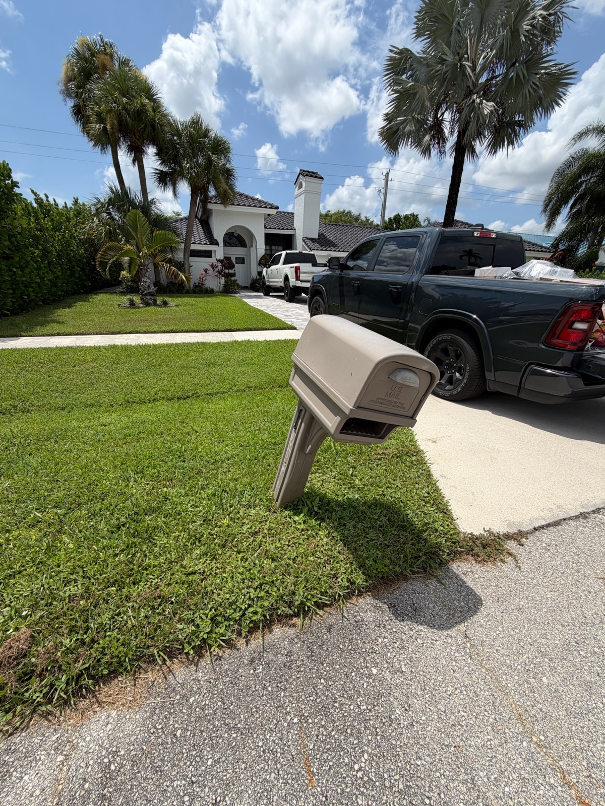 A design mockup of a custom mailbox and post prepared for architectural committee review