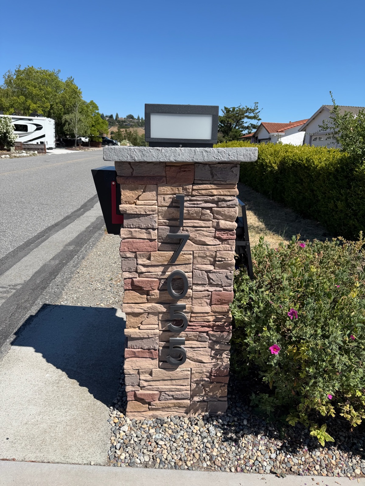 An approved mailbox mockup and spec detail used for board review