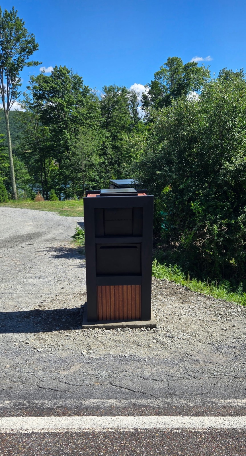 Matching custom mailboxes along a residential street in a large planned community